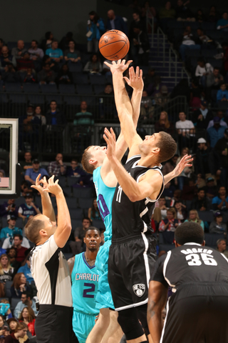 CHARLOTTE, NC - JANUARY 21: The opening tip off during the game Brook Lopez #11 of the Brooklyn Nets and Cody Zeller #40 of the Charlotte Hornets on January 21, 2017 at Spectrum Center in Charlotte, North Carolina. NOTE TO USER: User expressly acknowledges and agrees that, by downloading and or using this photograph, User is consenting to the terms and conditions of the Getty Images License Agreement. Mandatory Copyright Notice: Copyright 2017 NBAE (Photo by Brock Williams-Smith/NBAE via Getty Images)